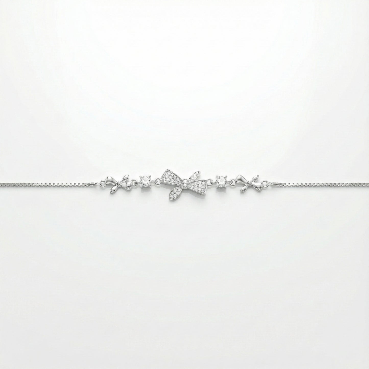 925 Silver Bow Charm Bracelet with Sparkling CZ Accents