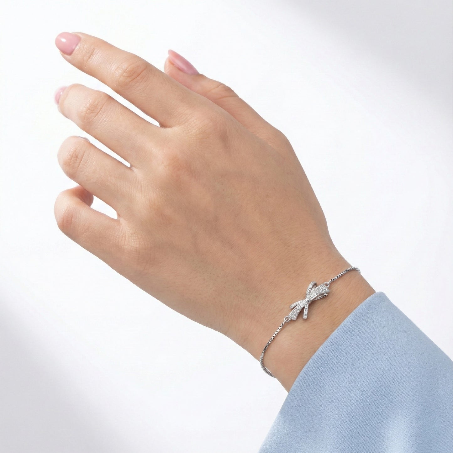 925 Silver Bow Tie Bracelet with Sparkling CZ Detailing