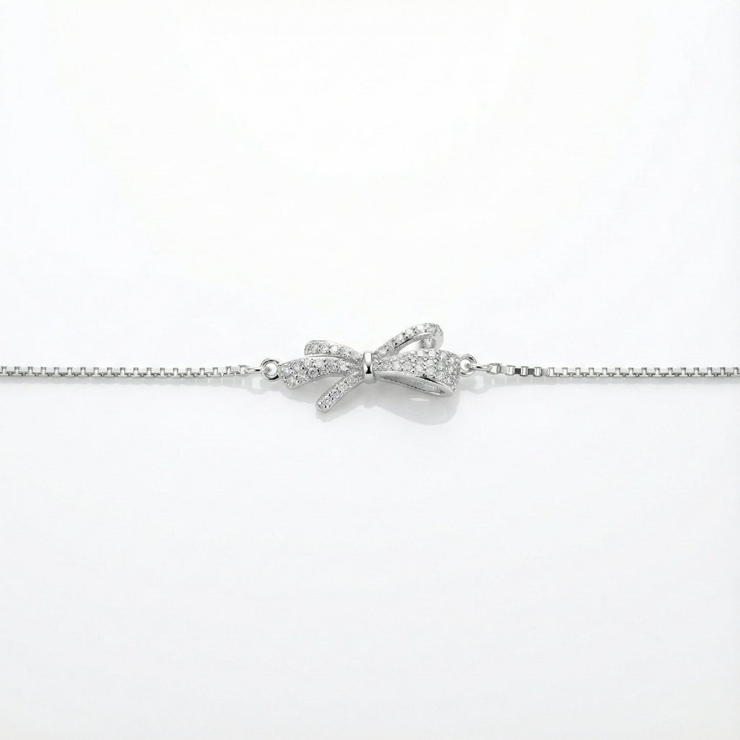 925 Silver Bow Tie Bracelet with Sparkling CZ Detailing